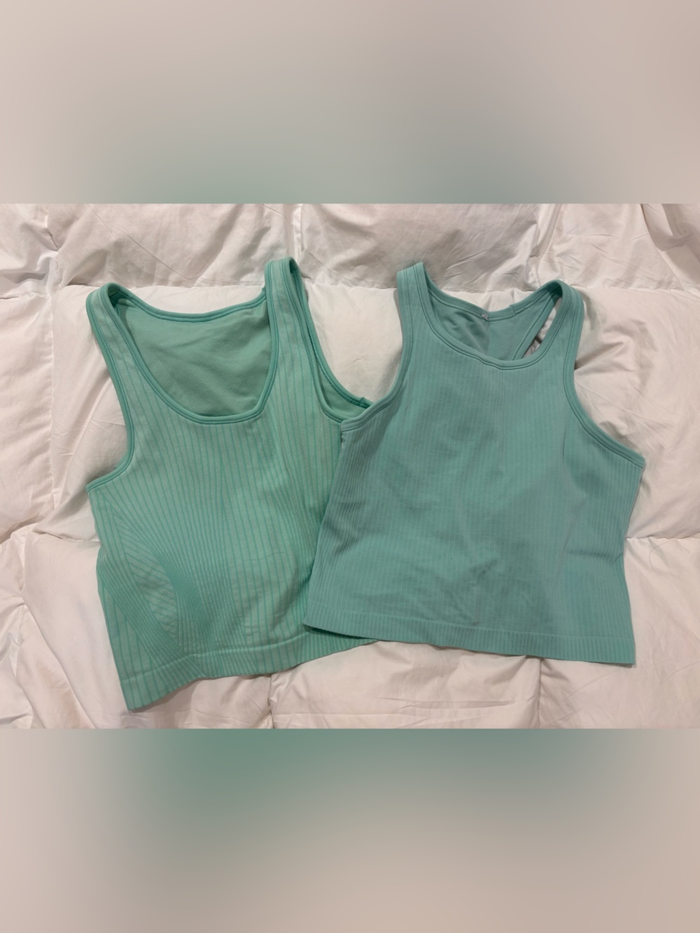 Lululemon Ebb to St cropped tanks